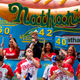 Contestants compete in the annual Nathan’s Hot Dog Eating Contest on July 4, 2018 in NYC.